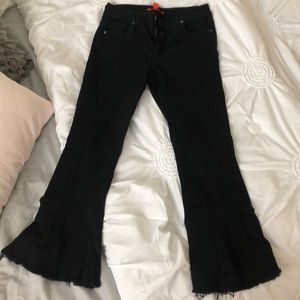 Black capris with fringe detail on bottom